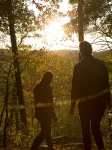 Two people watching the sunset at Sunset Point