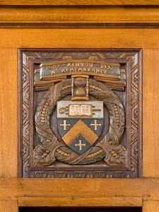 A carved wooden rendering of the Kenyon shield