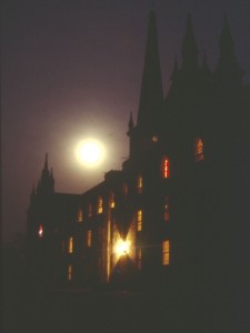 A full moon over a darkened Old Kenyon